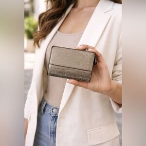 Coach metallic leather triple wallet